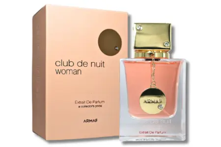 Armaf Club de Nuit Woman Extrait 7 Armaf Club De Nuit Woman Extrait: Botella rectangular con cadena dorada y caja rosa con punto metálico decorativo.