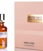 Perfume Vanilla Park de Maison Tahite: Botella simple de vidrio ámbar con caja texturizada en rosa pastel y oro metálico.