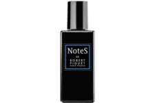 Robert Piguet Notes Orange Blossom Phallus: Frasco oscuro con diseño elegante y etiqueta azul; imagen centrada en el branding clásico de la marca.