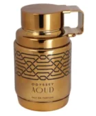 armaf odyssey aoud: Frasco dorado estilo granada de Armaf Odyssey Aoud, decorado con líneas geométricas negras. La tapa industrial resalta su carácter audaz y refinado, ideal para hombres con presencia.