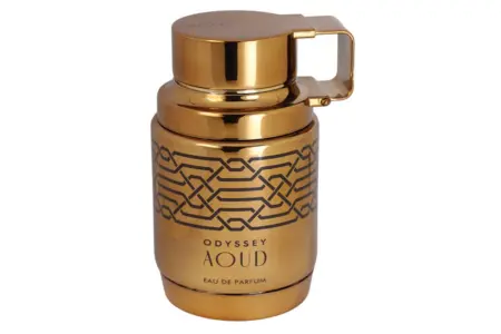 Armaf Odyssey Aoud 1 armaf odyssey aoud: Frasco dorado estilo granada de Armaf Odyssey Aoud, decorado con líneas geométricas negras. La tapa industrial resalta su carácter audaz y refinado, ideal para hombres con presencia.
