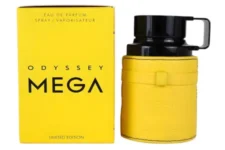 Odyssey Mega Armaf: Frasco negro con detalles en amarillo, envuelto en un estuche de cuero amarillo, acompañado de una caja amarilla que destaca por su diseño vibrante y moderno.